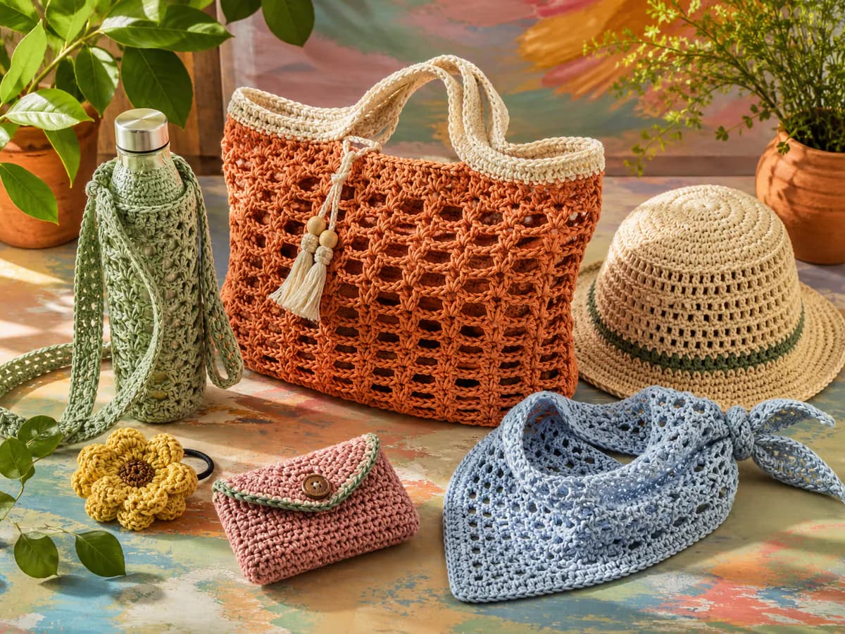 Crochet water-bottle sling, orange market tote, bucket hat, pouch, and blue mesh bag